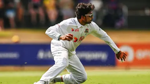 DARWIN, AUSTRALIA - AUGUST 16: Najmul Hossain Shanto of Bangladesh fields during day four of the First Test Match in the series between Australia and Bangladesh at Marrara Stadium on August 16, 2026 in Darwin, Australia. (Photo by Albert Perez - CA/Cricket Australia via Getty Images)