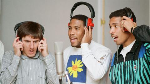 England World Cup Squad in the recording studio after joining music group New Order to record a World Cup Song ahead of the finals in Italy later this year, pictured 25th March 1990.