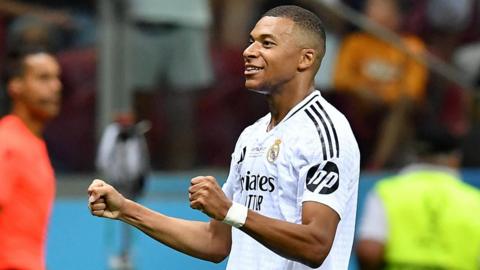 Kylian Mbappe celebrates