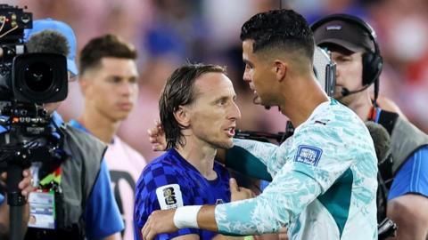 Luka Modric and Cristiano Ronaldo embrace at the end of the game