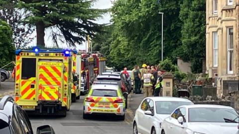 Emergency service vehicles lined up on Victoria Road 