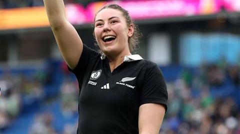 Maiakawanakaulani Roos and Liana Mikaele-Tu'u wave to Black Ferns supporters