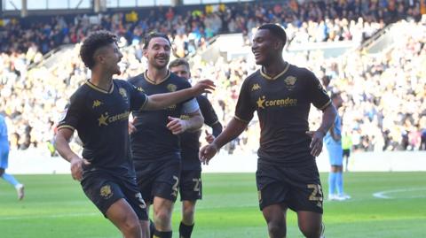 Hull celebrate their third goal