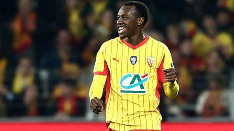 Saud Abdulhamid celebrates while playing for Lens
