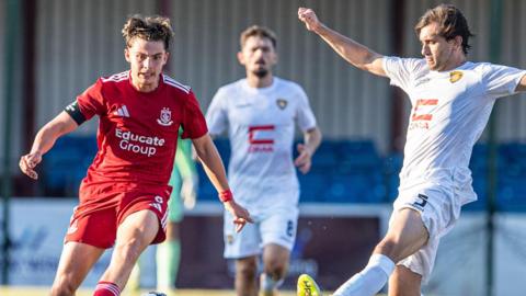 Connah's Quay's Callum West in action against Ballkani