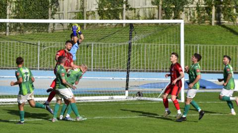 Guernsey FC in action against Raynes Park Vale