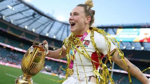 Meg Jones celebrates England's Rugby World Cup win