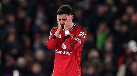 Manchester United captain Bruno Fernandes reacts after the 1-1 draw with West Ham