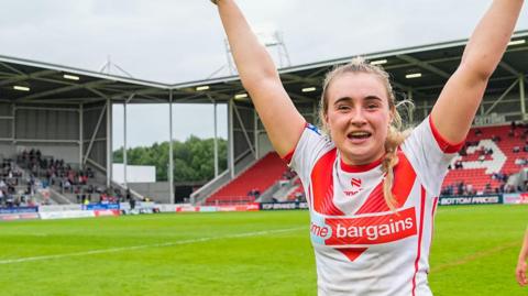 Paige Travis celebrates whilst with St Helens