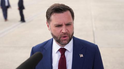 JD Vance speaking to reporters