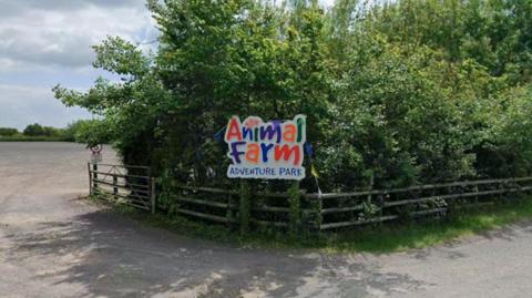 A Google Maps screengrab of the Animal Farm Adventure Park sign taken from the entrance of the adventure park.