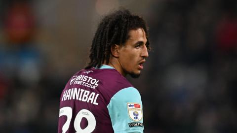 Hannibal Mejbri looking on with his mouth open in action for Burnley