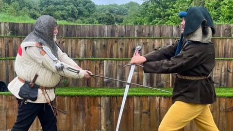 Members of the Bourne Retinue of Archers practising swordplay