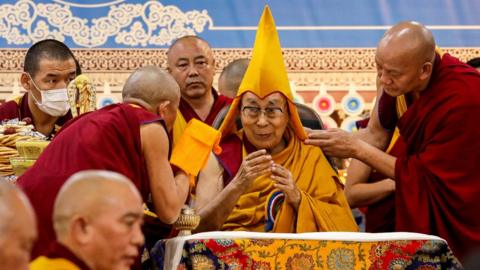 Tibetan spiritual leader the Dalai Lama (C) attends a Long Life Prayer offering ceremony at the Main Tibetan Temple in McLeod Ganj, near Dharamsala on June 30, 2025. 