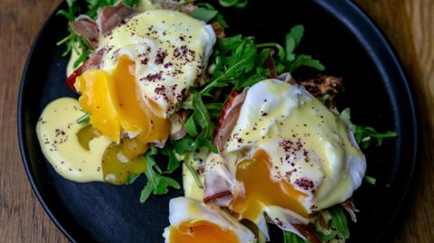 Plate with runny eggs