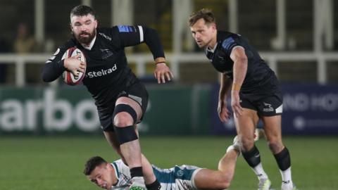 Newcastle centre Sam Arnold charging through against Gloucester