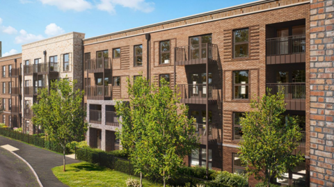 A CGI picture of the apartments, a four-storey block of flats with trees planted outside them.