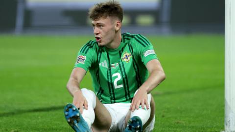 Conor Bradley shows his frustration during Northern Ireland's Nations League defeat in Bulgaria