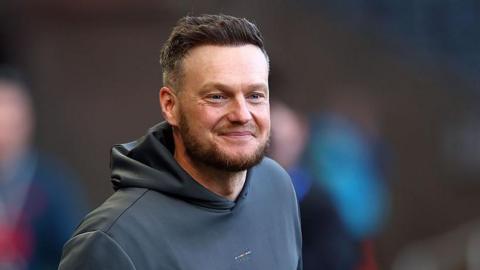 A smiling Middlesbrough head coach Kim Hellberg