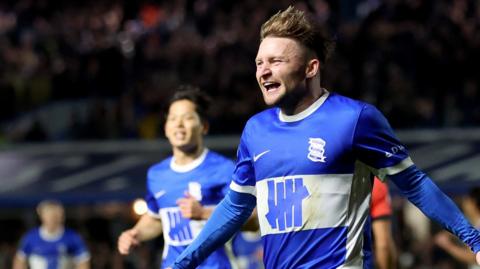 Alfie May celebrates a goal for Birmingham