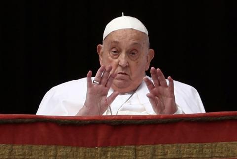 Pope Francis with his hands raised in blessing during his final public appearance