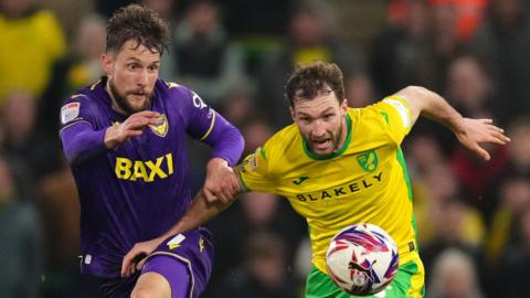 Oxford United's Hidde ter Avest (left) and Norwich City's Jack Stacey battle for the ball