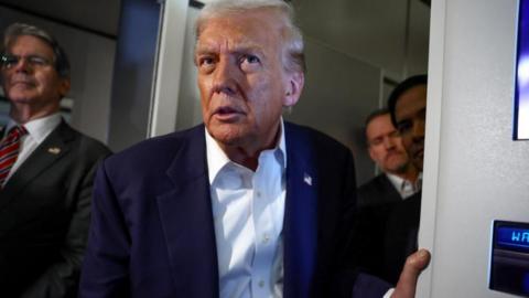 Donald Trump speaking to reporters on Air Force One on 25 October 2025