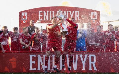 Michael Wilde and John Disney lead Connah's Quay's celebrations after their Welsh Cup final win over The New Saints at Newport's Rodney Parade.