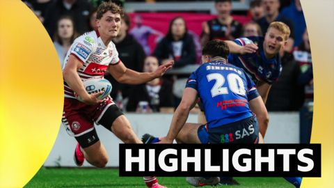 Wigan's Noah Hodkinson runs in to score a try against Wakefield