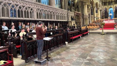 Canterbury Cathedral Choir rehearsing in the quire for the Archbishop's installation