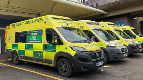 East Midlands ambulances parked in bays outside Queen's Medical Centre