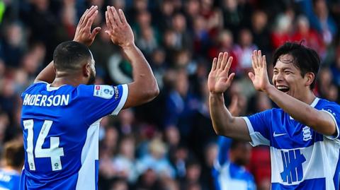 Birmingham goalscorer Keshi Anderson celebrates with Tomoki Iwata