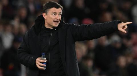 Preston boss Paul Heckingbottom delivers instructions to his players