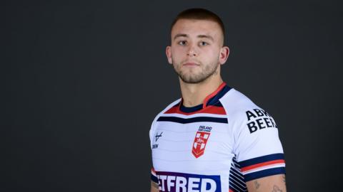 Mikey Lewis in an England shirt