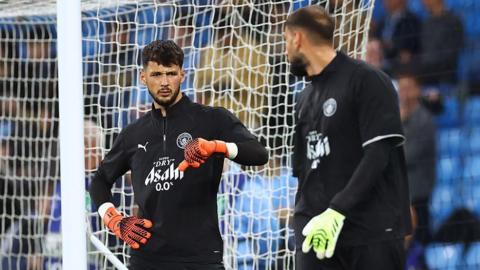 James Trafford and Gianluigi Donnarumma
