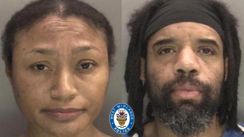 Tamara and Damion Thomas pictured in a mugshot with no expression on their faces. Tamara has he hair slicked back behind her while Damion has thick shoulder length dreadlocks and wears a thick black headband across his forehead.
