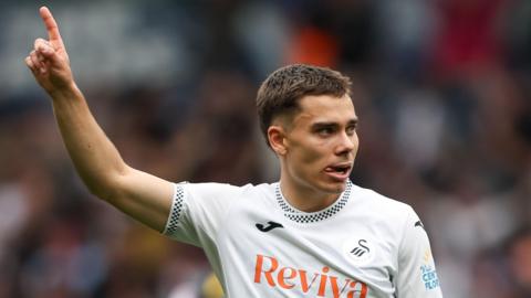Leo Walta celebrates scoring for Swansea
