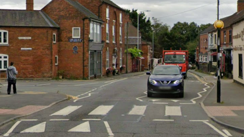 Traffic in Earl Shilton High Street.