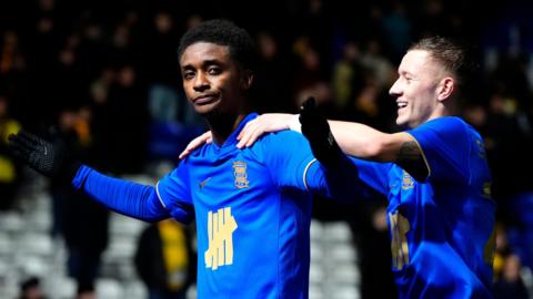 Birmingham City's Demarai Gray (left) celebrates scoring their side's second goal of the game with team-mate Jay Stansfield