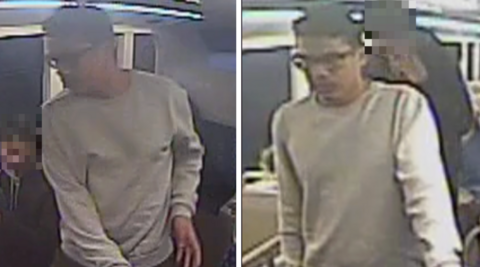 A grainy CCTV image of a man police wish to speak to. He is wearing glasses, a light-coloured jumper and is stood up.