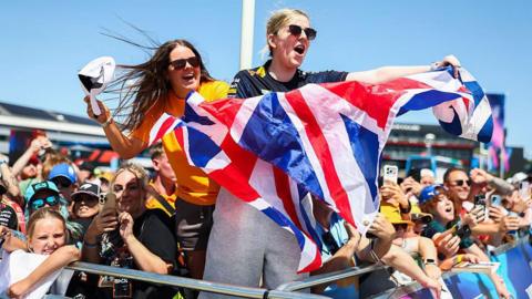 Fans hold up a Union Jack flag at Silverstone