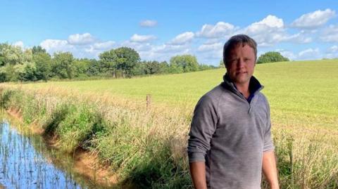 Farmer Joe Orgee by his wetland pools 