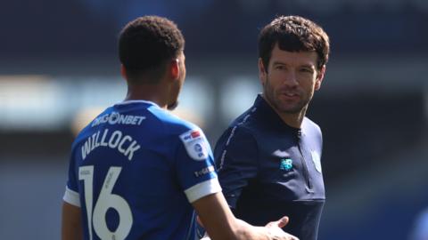 Cardiff City's Chris Willock (left) and head coach Brian Barry-Murphy