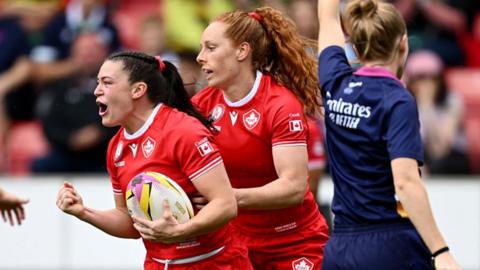 Alysha Corrigan celebrates scoring for Canada against Wales
