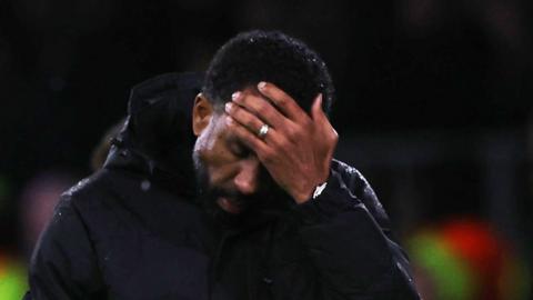 Wilfried Nancy puts his hand to his head after losing his second match in charge of Celtic