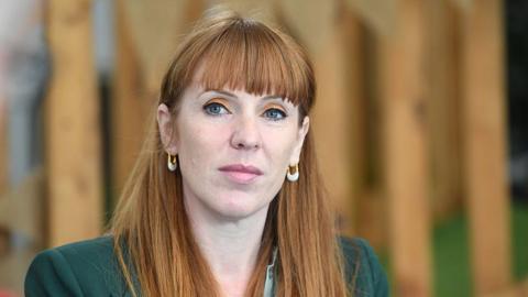 Deputy Prime Minister Angela Rayner wearing a green top