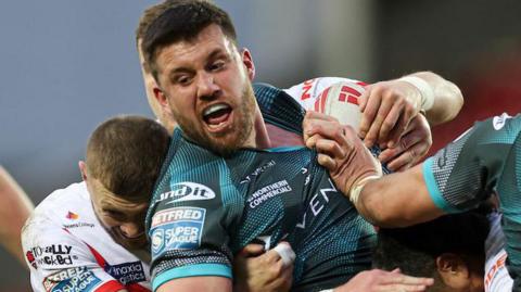 Huddersfield Giants' Joe Greenwood is tackled