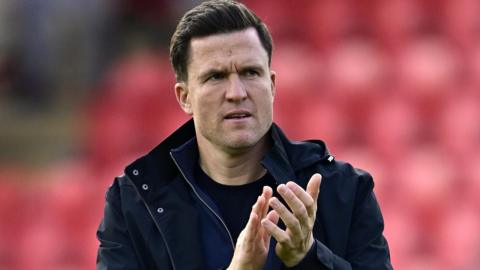 Gary Caldwell clapping 