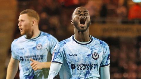Cameron Antwi celebrates his equaliser
