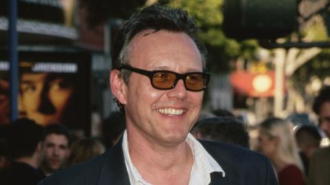 Anthony Head smiling and wearing sunglasses